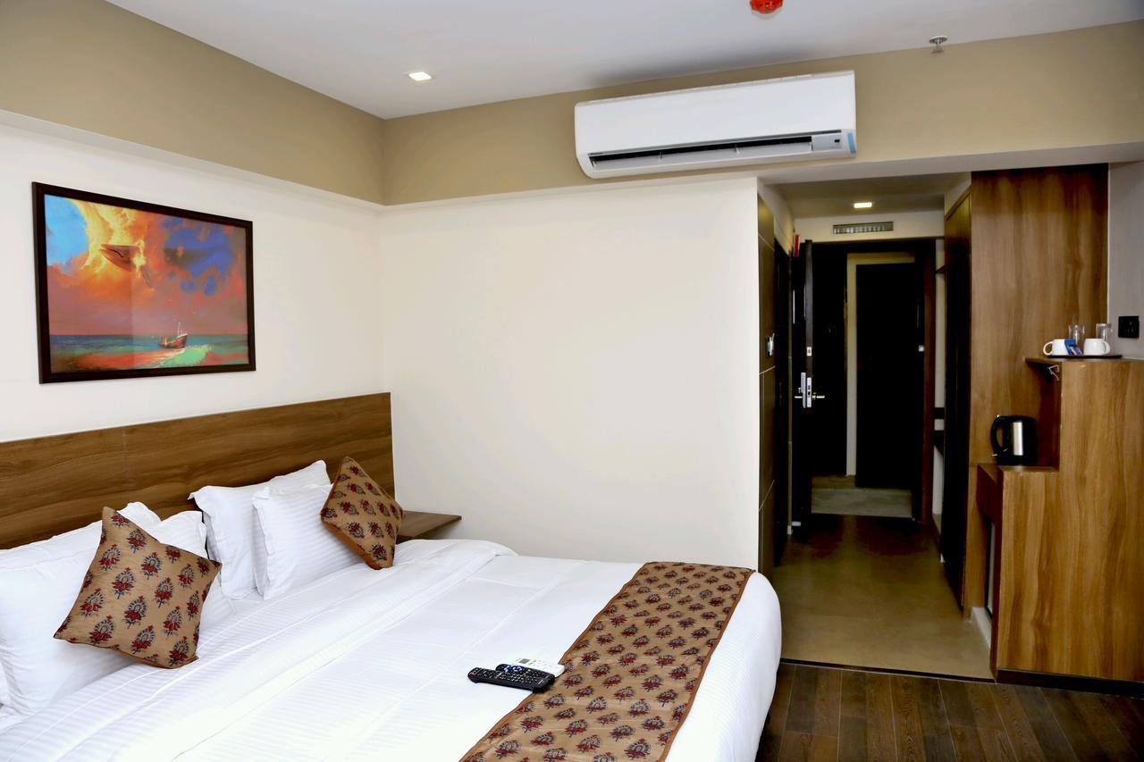 Hotel Mumbai House Andheri East, Mumbai Bagian luar foto